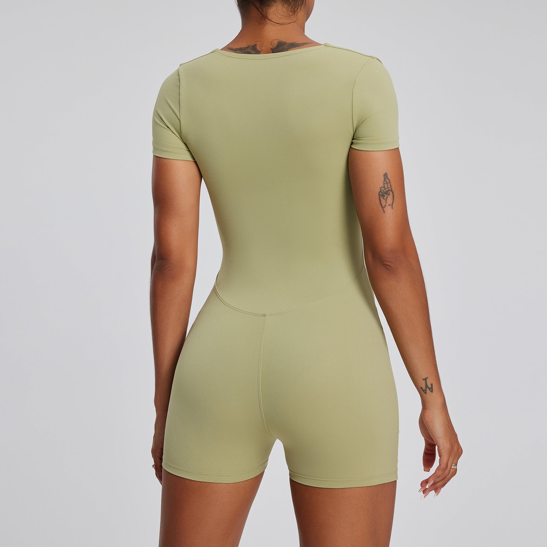 Jumpsuit sport moulant à col carré